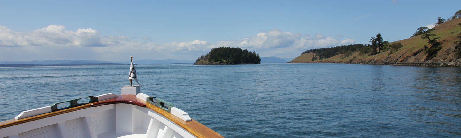 Bow of yacht on crewed charter in San Juan Islands