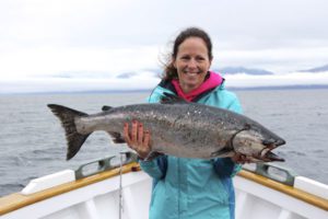 Woman holding salmon