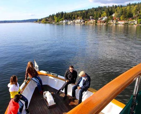 Guests on bow - Seattle yacht charter in Lake Washington